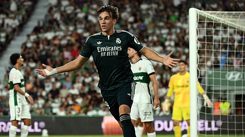 Real Madrid's Spanish forward Carlos Espi Escrihuela celebrates scoring his team's third goal during the Spanish league football match between Elche CF and Real Madrid CF at Martinez Valero Stadium in Elche on September 15, 2026.