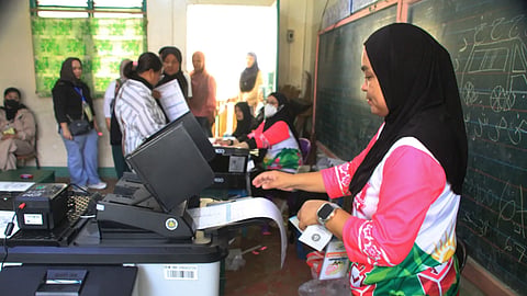 A Muslim woman votes at the Bangsamoro Autonomous Region in Muslim Mindanao parliamentary elections at a school in Lanao del Sur province, southern Philippines, Monday, Sept. 14, 2026