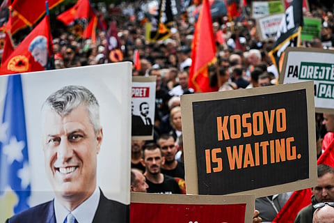 Kosovo Albanians holding a placard reading "Kosivo is waiting" and an image of former President Hashim Thaci take part in the the “March for Freedom” in Pristina on September 12, 2026, four days before the verdict in the war crimes trial of Hashim Thaci is due to be announced.