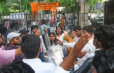 A student group raises slogans during campaigning at north campus.