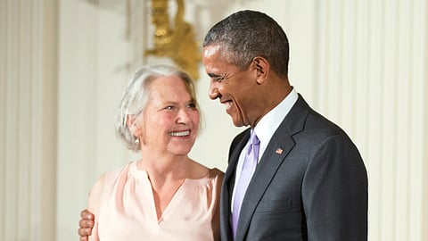 President Barack Obama appears with author Annie Dillard, recipient of the 2014 National Humanities Medal, during a ceremony in the East Room at the White House in Washington on Sept. 10, 2015. 
