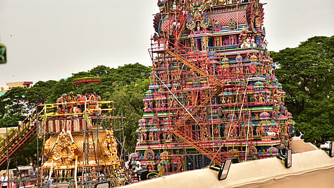 Large numbers of devotees who had obtained colour-coded passes were accommodated atop the various temple mandapams to witness the rituals. 