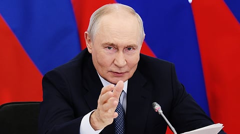 Russian President Vladimir Putin speaks at a research facility in Koltsovo near Novosibirsk, Russia, Tuesday, Aug. 11, 2026. 