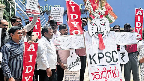 Members of the Job Aspirants’ Struggle Committee, AIDYO and others protest against KPSC irregularities at Freedom Park in Bengaluru on Friday 
