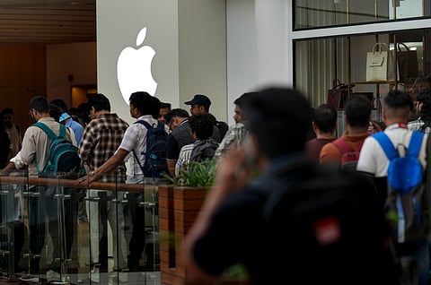  People wait in a queue outside the Apple Store at Select Citywalk Mall during the official sales launch of the iPhone 18 Pro and iPhone 18 Pro Max, in New Delhi, Friday, Sept. 18, 2026.