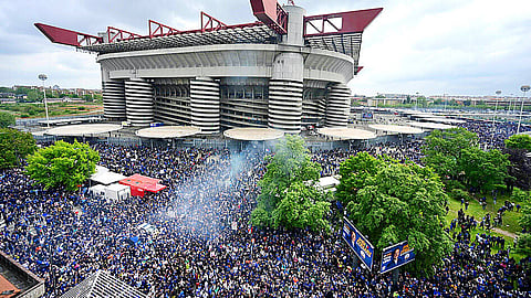 Inter supporters celebrate winning the Italian Serie A outside the San Siro in Milan, Italy, after their match against Torino in April 2024