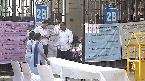 Security personnel and officials during the counting of vote for the Delhi University Students' Union (DUSU) elections as it gets underway amid heightened security, in New Delhi, Saturday, Sept. 19, 2026. 
