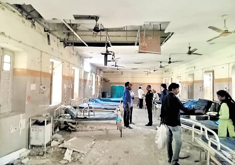 The dangling bits of the false ceiling in the MGM Hospital in Warangal on Sunday
