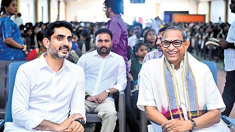HRD and IT Minister Nara Lokesh and Govt Advisor Chaganti Koteswara Rao at a programme on school education in Kakinada on Sunday 