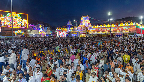 Devotees throng to witness the Lord Sri Venkateswara Swamy being taken in a procession as part of Garuda Vahana Seva during ongoing Brahmotsavams in Tirumala on Saturday. 