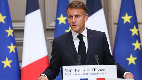 French President Emmanuel Macron gestures as he addresses the audience during a press conference following a meeting with the 2027 presidential election candidates and party leaders focused on the geopolitical situation and its consequences, at the presidential Elysee Palace in Paris, Friday, Sept. 18, 2026.