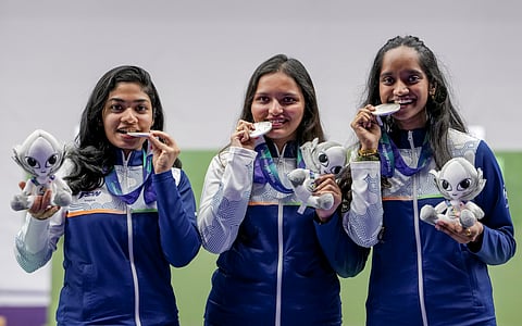 (from left) Vidarsa K Vinod, Sonam Maskar and Elavenil Valarivan during the medal ceremony in Aichi, Japan, on Sunday