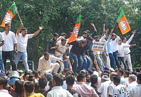 Delhi BJP workers staged a protest outside the Aam Aadmi Party (AAP) office on Sunday, September 20, 2026, demanding the expulsion of AAP MCD councillor Vijay Kumar.
