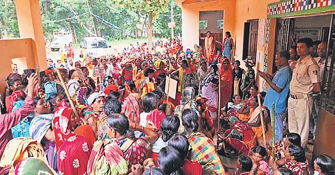 Women staging dharna outside Kotpad police station on Monday.
