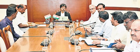 Chief Minister C Joseph Vijay chairing a review meeting on the rollout of expanded free bus travel scheme at the secretariat on Monday 