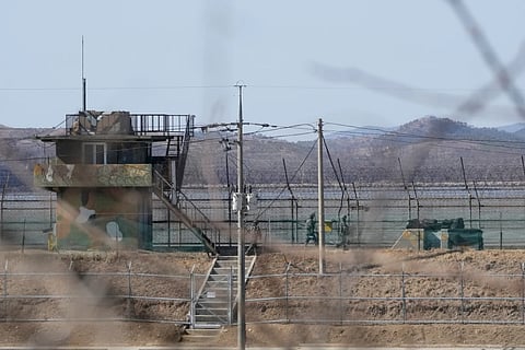 South Korean army soldiers patrol along the barbed-wire fence in Paju, South Korea, near the border with North Korea, on Feb. 18, 2025.