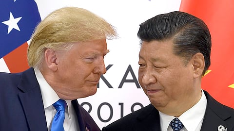 FILE - President Donald Trump, left, meets with Chinese President Xi Jinping during a meeting on the sidelines of the G-20 summit in Osaka, Japan, June 29, 2019.