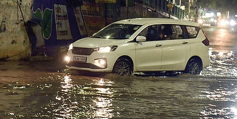 Waterlogging in Chetpet road due to heavy showers on Monday ]