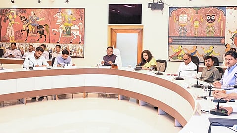 Former IAS officer Ashok Tripathy led panel submits report on teachers issues to Chief Minister Mohan Charan Majhi in Lok Seva Bhawan.