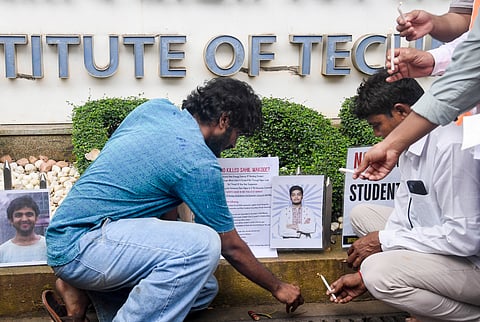 Demonstrators stage a candlelight protest to pay tribute to the suicide victims of IIT Bombay, in Mumbai, Monday, Sept. 21, 2026. 