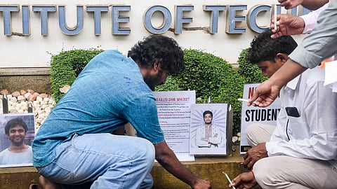 Demonstrators stage a candlelight protest to pay tribute to the suicide victims of IIT Bombay, in Mumbai, Monday, Sept. 21, 2026.
