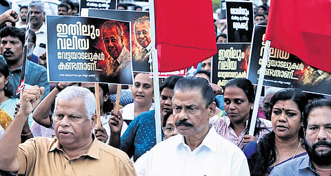 CPM state secretary M V Govindan and others take part in a protest march organised by the party’s Thiruvananthapuram district committee in front of the Secretariat on Tuesday against the government’s decision to order a probe against Leader of Opposition Pinarayi Vijayan