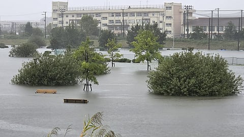 Flooding inundates a park as heavy rain falls amid weather patterns due to Typhoon Dujuan in Ichikawa city, Chiba Prefecture on September 21, 2026.