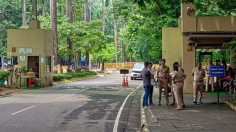 Police personnel stand guard outside the Indian Institute of Technology (IIT) Bombay campus following the recent death by suicide of a 22-year-old second-year B.Tech student in Mumbai, Maharashtra, Tuesday, Sept. 22, 2026.