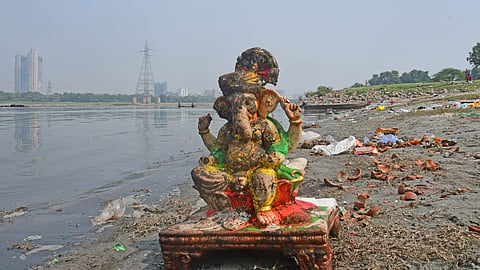 Ganesh idols were found on the Kalindi Kunj Ghat on Tuesday despite DPCC’s ban on direct idol immersion in the Yamuna and local water bodies.