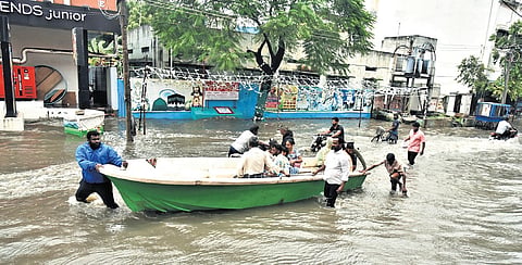 File photo of Chennai residents being shifted in boats during floods.   