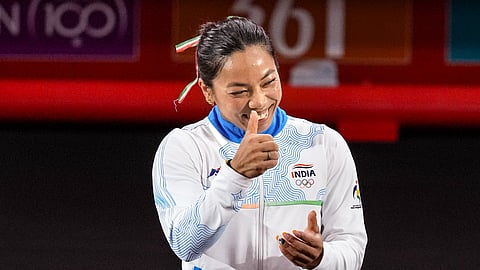 India's Mirabai Chanu arrives to compete in the Women's 49kg Group A weightlifting final match during the 20th Asian Games, in Nagoya, Japan, Wednesday, Sept. 23, 2026.