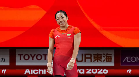 Mirabai Chanu smiles after securing silver