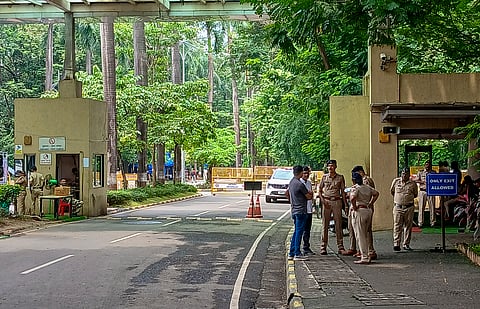  Police personnel stand guard outside Indian Institute of Technology (IIT) Bombay campus following the recent death by suicide of a 22-year-old second-year B Tech student, in Mumbai, Maharashtra, Tuesday, Sept. 22, 2026.