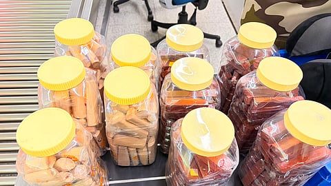 Nine containers of with sandalwood bars.