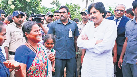 Deputy Chief Minister Pawan Kalyan interacts with residents of Nagulapalli after inaugurating a drinking water project in the  village on Tuesday 