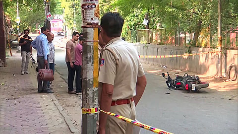  Special staff of the South East District Police conduct an investigation at the encounter site after one of the accused in the alleged gang-rape near Kalkaji Temple was apprehended following a brief exchange of fire with the police, in New Delhi on Tuesday.