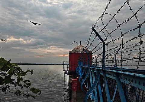 Dark rain clouds hovering over Puzhal lake in Chennai.