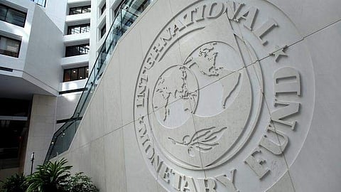 The International Monetary Fund logo is seen inside its headquarters.