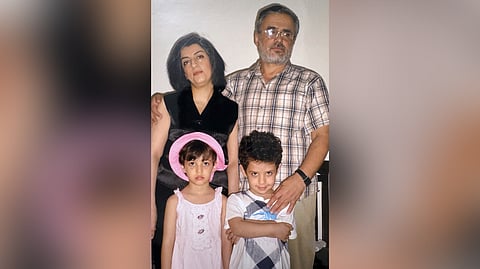 This 2012 photo provided by the Narges Foundation shows Nobel Peace Prize laureate Narges Mohammadi, top left, with her husband, Taghi Rahmani and their twin children, Kiana, bottom left, Ali, bottom right, in Tehran, Iran. 
