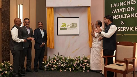 Chief Minister V.D. Satheesan releases the logo of CIAL ACES (Aviation Consultancy and Expert Services), the aviation consultancy initiative of Cochin International Airport Limited. Minister Roji M. John, CIAL Managing Director S. Suhas, and members of the CIAL ACES team are seen alongside.