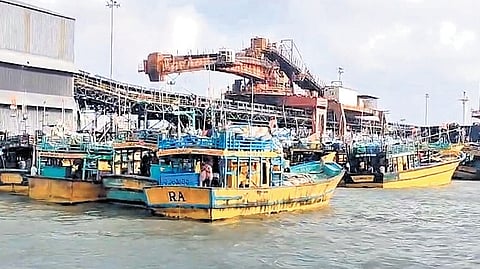 Fishing vessels from Andhra Pradesh in the restricted jetty area of the port.