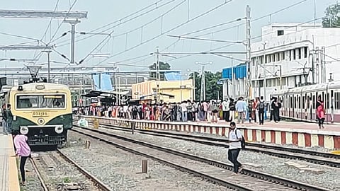 Passengers waiting at Gummidipundi railway station on Thursday 