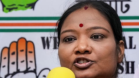 Arpita Pradhan wife of jailed Congress candidate Milan Pradhan for the Nandigram assembly by-poll, during a press conference, in Kolkata, Thursday, Sept. 24, 2026.