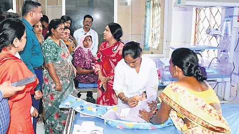 Adilabad District Collector Rajarshi Shah interacts with parents at the newly opened SNCU ward at RIMS on Thursday.