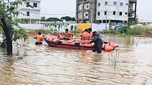 ODRAF personnel on way to rescue stranded residents in Berhampur.