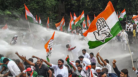 Police personnel deploy a water cannon against Congress supporters during a protest rally to Bihar State Election Commission against alleged unilateral decisions of Chief Election Commissioner (CEC) Gyanesh Kumar and over issues related to the SIR and voter lists, in Patna, Friday, Sept. 25, 2026. 