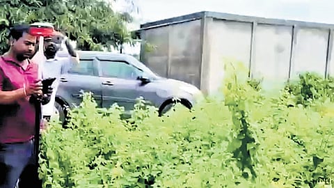 Officials conduct survey of lands in the Survey No 325 at Erravali village on Friday