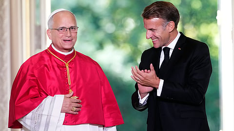 Pope Leo XIV, left, and French President Emmanuel Macron, attend a joint statement at the Elysee Palace, Friday, Sept. 25, 2026.