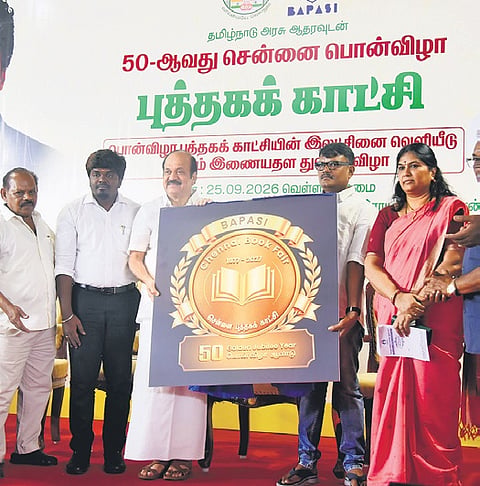 Speaker JCD Prabhakar is releasing the logo marking 50 years of the Chennai Book Fair, in the presence of office-bearers of BAPASI   