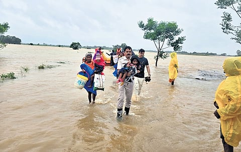 (From left) Villagers being evacuated from a flooded area in Nabarangpur; flood-hit Madhuban in Mayurbhanj’s Baripada; and a tree blocking NH-516 between Chhatrapur and Gopalpur in Ganjam district | express